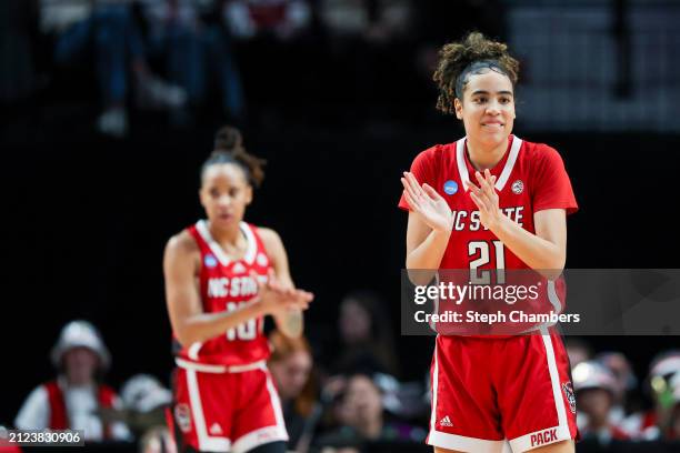 Madison Hayes of the NC State Wolfpack claps during the first half against the Stanford Cardinal in the Sweet 16 round of the NCAA Women's Basketball...