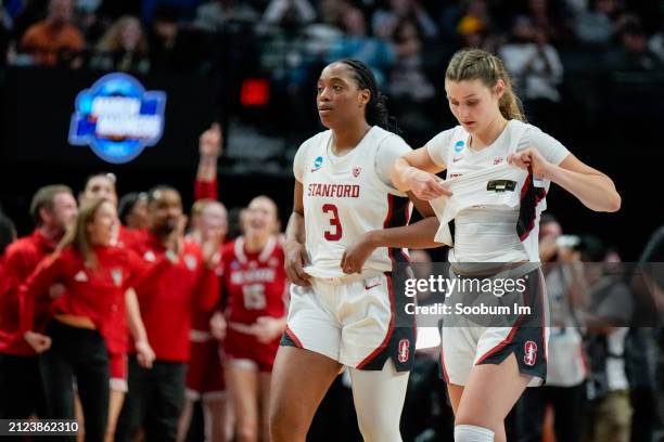 Nunu Agara and Hannah Jump of the Stanford Cardinal react after losing to the NC State Wolfpack 77-67 in the Sweet 16 round of the NCAA Women's...