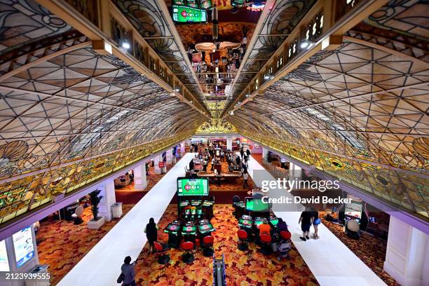 Portion of the 4,000 square-foot stained-glass ceiling is seen over gaming machines at the Tropicana Las Vegas on March 29 in Las Vegas, Nevada. The...