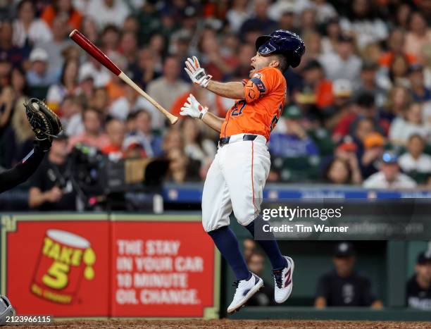 Jose Altuve of the Houston Astros gets out of the way of an inside pitch in the seventh inning against the New York Yankees at Minute Maid Park on...