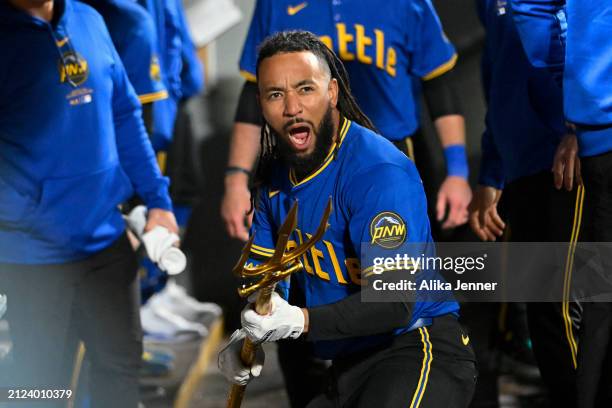 Crawford of the Seattle Mariners celebrates with teammates to hitting a solo home run during the sixth inning against the Boston Red Sox at T-Mobile...