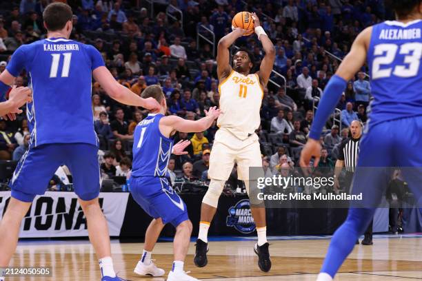 Tobe Awaka of the Tennessee Volunteers shoots the ball against Steven Ashworth of the Creighton Bluejays during the second half in the Sweet 16 round...