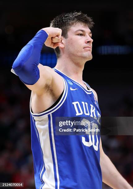 Kyle Filipowski of the Duke Blue Devils reacts after scoring during the second half of the Sweet 16 round of the NCAA Men's Basketball Tournament...