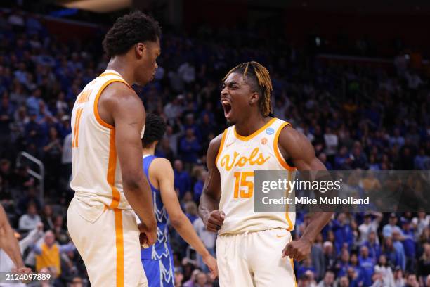 Tobe Awaka celebrates with Jahmai Mashack of the Tennessee Volunteers during the second half against the Creighton Bluejays in the Sweet 16 round of...