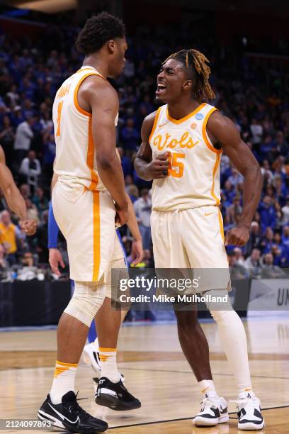 Tobe Awaka celebrates with Jahmai Mashack of the Tennessee Volunteers during the second half against the Creighton Bluejays in the Sweet 16 round of...