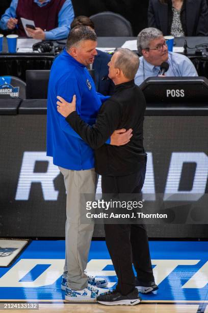 Head Basketball Coaches Greg McDermott of the Creighton Blue Jays and Rick Barnes of the Tennessee Volunteers shake hands after a NCAA Men's...