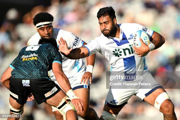 Akira Ioane of the Blues makes a break during the round six Super Rugby Pacific match between Moana Pasifika and Blues at Eden Park, on March 30 in...