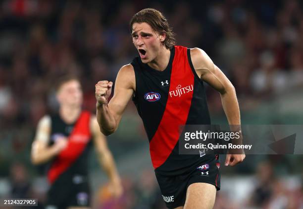Harrison Jones of the Bombers celebrates kicking a goal during the round three AFL match between Essendon Bombers and St Kilda Saints at Marvel...