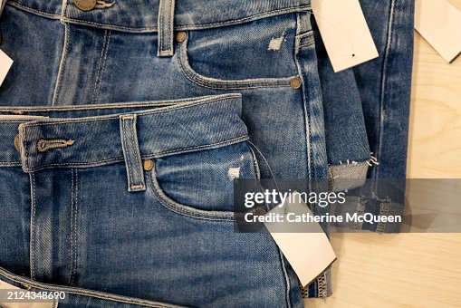 Stacks of folded denim jean short shorts Stacks of folded denim jean short shorts