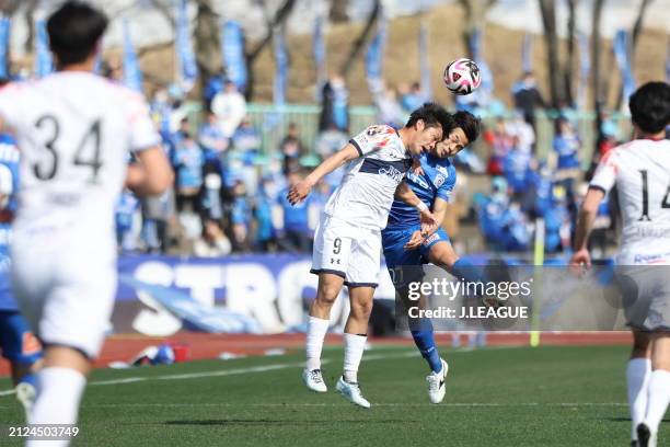 Yoshihito KONDO of IWAKI FC and Keita YOSHIOKA of Blaublitz Akita battle for the ball during the J.LEAGUE MEIJI YASUDA J2 7th Sec. Match between...