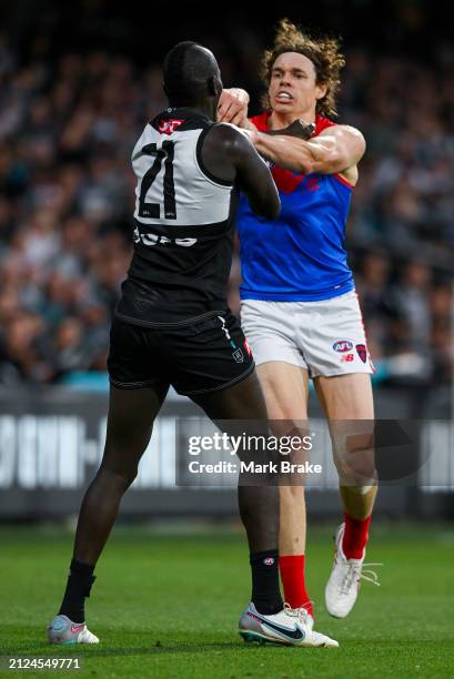 Aliir Aliir of the Power pushes Ben Brown of the Demons during the round three AFL match between Port Adelaide Power and Melbourne Demons at Adelaide...