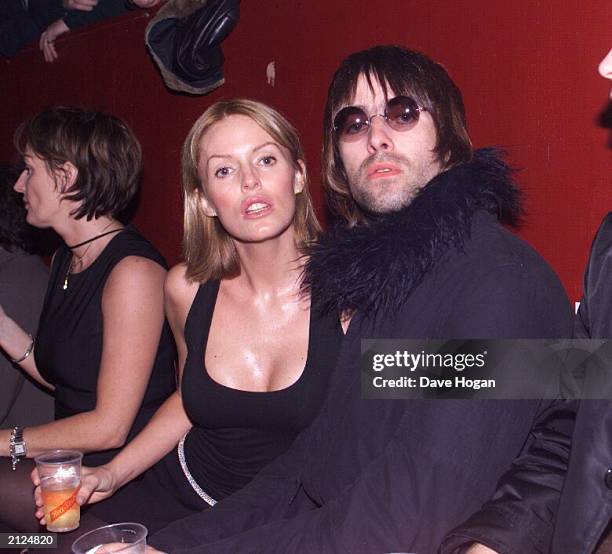 Rock star Liam Gallagher of Oasis and his wife actress Patsy Kensit attend a concert by The Who at SHepherd's Bush Empire, London on December 22 1999.