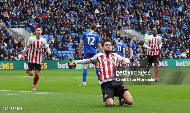 Adil Aouchiche of Sunderland celebrates scoring the first goal during the Sky Bet Championship match between Cardiff City and Sunderland at Cardiff...