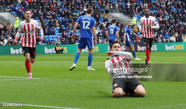 Adil Aouchiche of Sunderland celebrates scoring the first goal during the Sky Bet Championship match between Cardiff City and Sunderland at Cardiff...