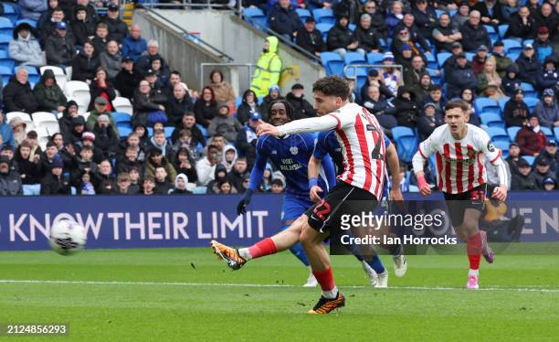 Adil Aouchiche of Sunderland scores from the penalty spot during the Sky Bet Championship match between Cardiff City and Sunderland at Cardiff City...
