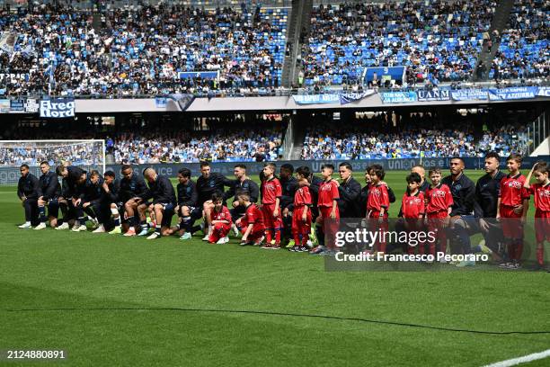 Napoli team on their knees to say no to racism before the Serie A TIM match between SSC Napoli and Atalanta BC at Stadio Diego Armando Maradona on...