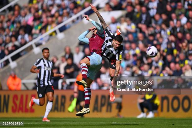 Lucas Paqueta of West Ham United clashes with Bruno Guimaraes of Newcastle United during the Premier League match between Newcastle United and West...