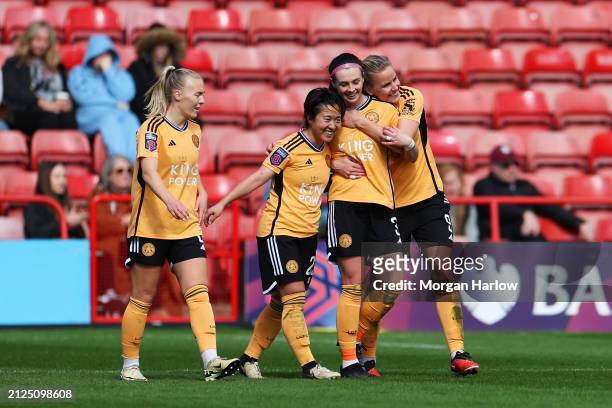 Sam Tierney of Leicester City celebrates scoring her team's second goal with teammates Yuka Momiki and Lena Petermann during the Barclays Women´s...