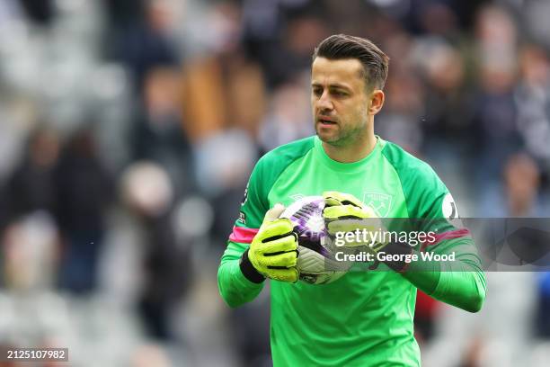 Lukasz Fabianski of West Ham United replaces teammate Alphonse Areola at half time during the Premier League match between Newcastle United and West...