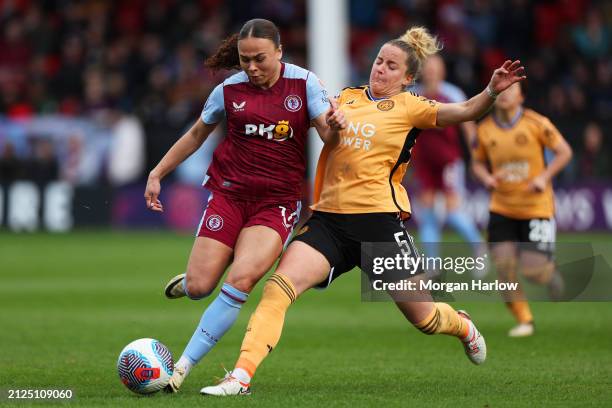 Danielle Turner of Aston Villa is challenged by Sophie Howard of Leicester City during the Barclays Women´s Super League match between Aston Villa...