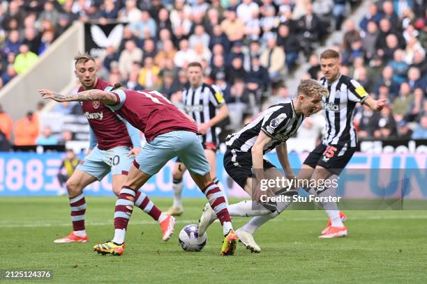 Kalvin Phillips of West Ham United fouls Anthony Gordon of Newcastle United which results in a penalty for Newcastle United during the Premier League...