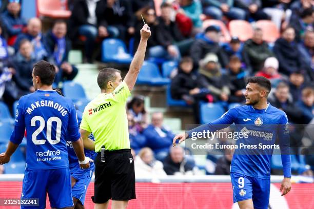 Oscar Rodriguez Portu of Getafe CF see the yellow card during the Spanish League, LaLiga EA Sports, football match played between Getafe CF and...