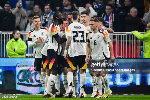 Florian Wirtz of Germany celebrating his goal with his teammates during the international friendly match between France and Germany at Groupama...