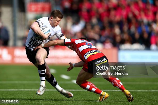 Noah Heward of Bristol is tackled by Stephen Varney of Gloucester during the Gallagher Premiership Rugby match between Gloucester Rugby and Bristol...