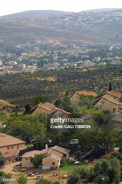 View from the West Bank settlement of Shilo, 10 kilometers north of Ramallah, shows the red roofed houses of the settlement and in the background the...