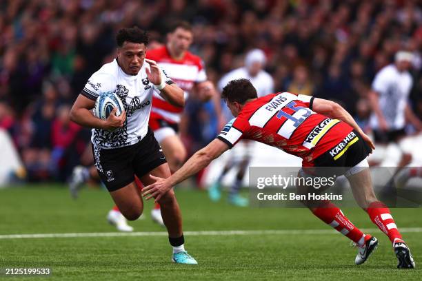 Gabriel Oghre of Bristol breaks cleaer to score his team's second try of the game during the Gallagher Premiership Rugby match between Gloucester...