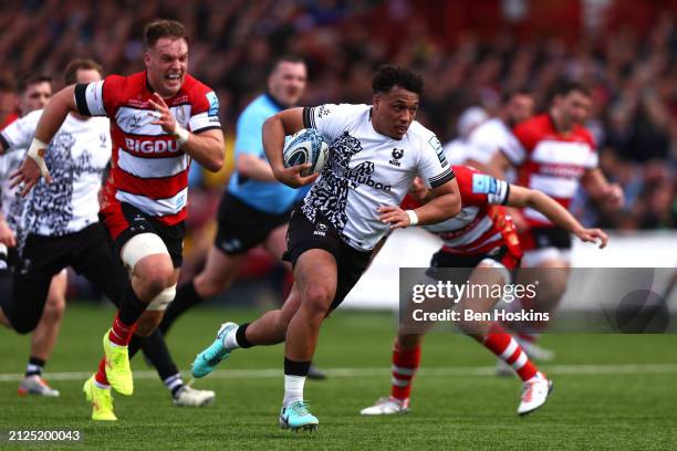 Gabriel Oghre of Bristol breaks cleaer to score his team's second try of the game during the Gallagher Premiership Rugby match between Gloucester...