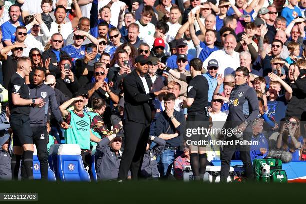 Vincent Kompany, Manager of Burnley, is shown a red card by Referee Darren England during the Premier League match between Chelsea FC and Burnley FC...