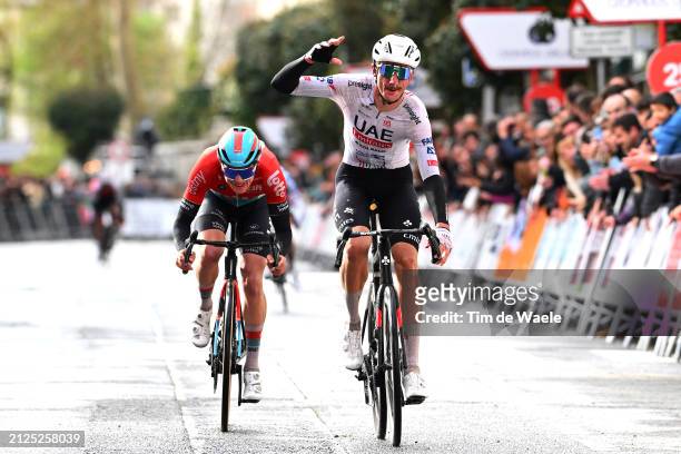 Brandon Mcnulty of The United States and UAE Team Emirates celebrates at finish line as race winner ahead of Maxim Van Gils of Belgium and Team Lotto...