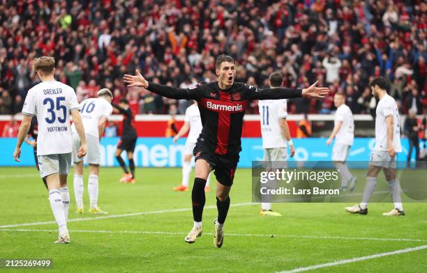 Patrik Schick of Bayer Leverkusen celebrates scoring his team's second goal during the Bundesliga match between Bayer 04 Leverkusen and TSG...