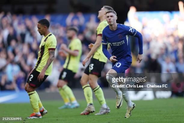 Cole Palmer of Chelsea celebrates scoring his team's second goal during the Premier League match between Chelsea FC and Burnley FC at Stamford Bridge...
