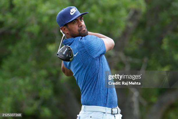 Tony Finau of the United States hits a tee shot on the first hole during the third round of the Texas Children's Houston Open at Memorial Park Golf...