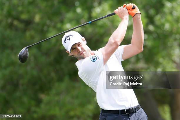 Thomas Detry of Belgium hits a tee shot on the first hole during the third round of the Texas Children's Houston Open at Memorial Park Golf Course on...