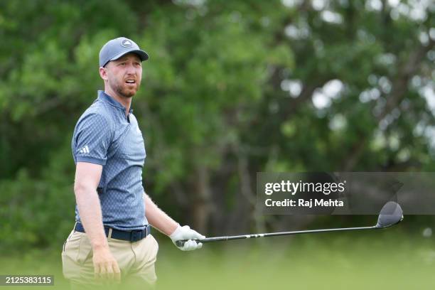 Daniel Berger of the United States watches his shot from the first tee during the third round of the Texas Children's Houston Open at Memorial Park...