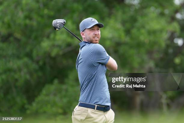 Daniel Berger of the United States hits a tee shot on the first hole during the third round of the Texas Children's Houston Open at Memorial Park...