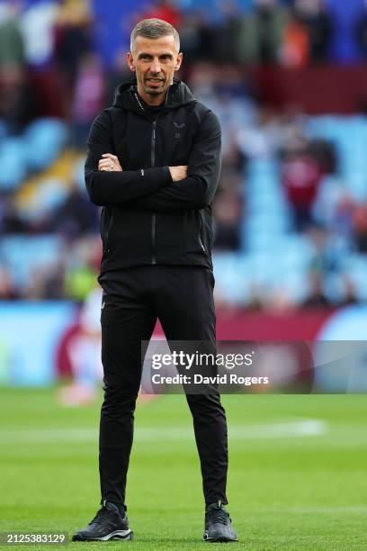 Gary O'Neil, Manager of Wolverhampton Wanderers, looks on as his team warms up prior to the Premier League match between Aston Villa and...