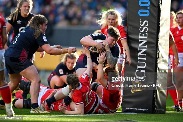 Hannah Botterman of England goes over to score her team's third try during the Guinness Women's Six Nations 2024 match between England and Wales at...