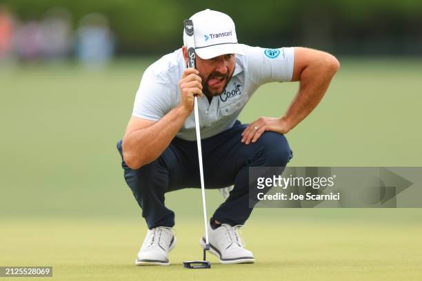 Stephan Jaeger of Germany lines up a putt on the sixth green during the third round of the Texas Children's Houston Open at Memorial Park Golf Course...