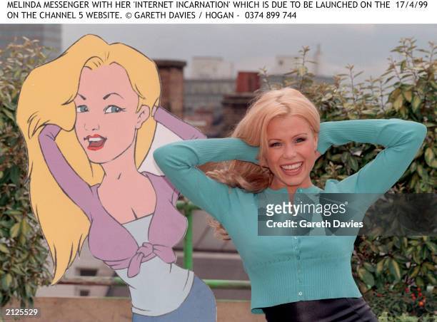 Presenter Melinda Messenger poses with her 'Internet incarnation' for the launch of the Channel 5 website on the roof of Channel 5 offices in Covent...