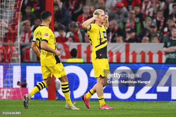 Julian Ryerson of Borussia Dortmund celebrates scoring his team's second goal during the Bundesliga match between FC Bayern München and Borussia...