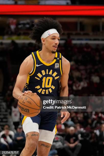 Kendall Brown of the Indiana Pacers dribbles the ball during the second half against the Chicago Bulls at the United Center on March 27, 2024 in...