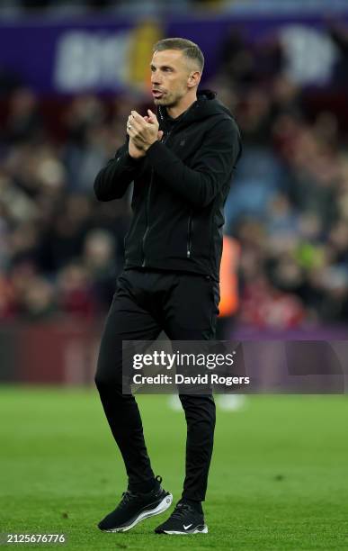 Gary O'Neil, Manager of Wolverhampton Wanderers, applauds the fans after the team's defeat in the Premier League match between Aston Villa and...