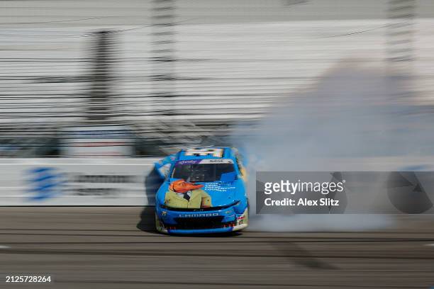 Joey Gase, driver of the NCPC Race Against Crime Chevrolet, spins after an on-track incident during the NASCAR Xfinity Series ToyotaCare 250 at...
