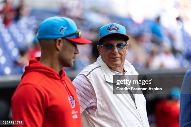 Skip Schumaker of the Miami Marlins with the Miami Marlins owner Bruce Sherman before the game against the Pittsburgh Pirates at loanDepot park on...