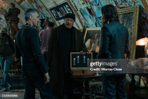Director, Chad Stahelski and actors, Laurence Fishburne and Keanu Reeves on the set of the film, "John Wick: Chapter 4", Paris, France, 2021.
