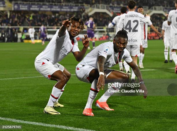 Rafael Leao of AC Milan celebrates with Samuel Chukwueze after scoring the team's second goal during the Serie A TIM match between ACF Fiorentina and...